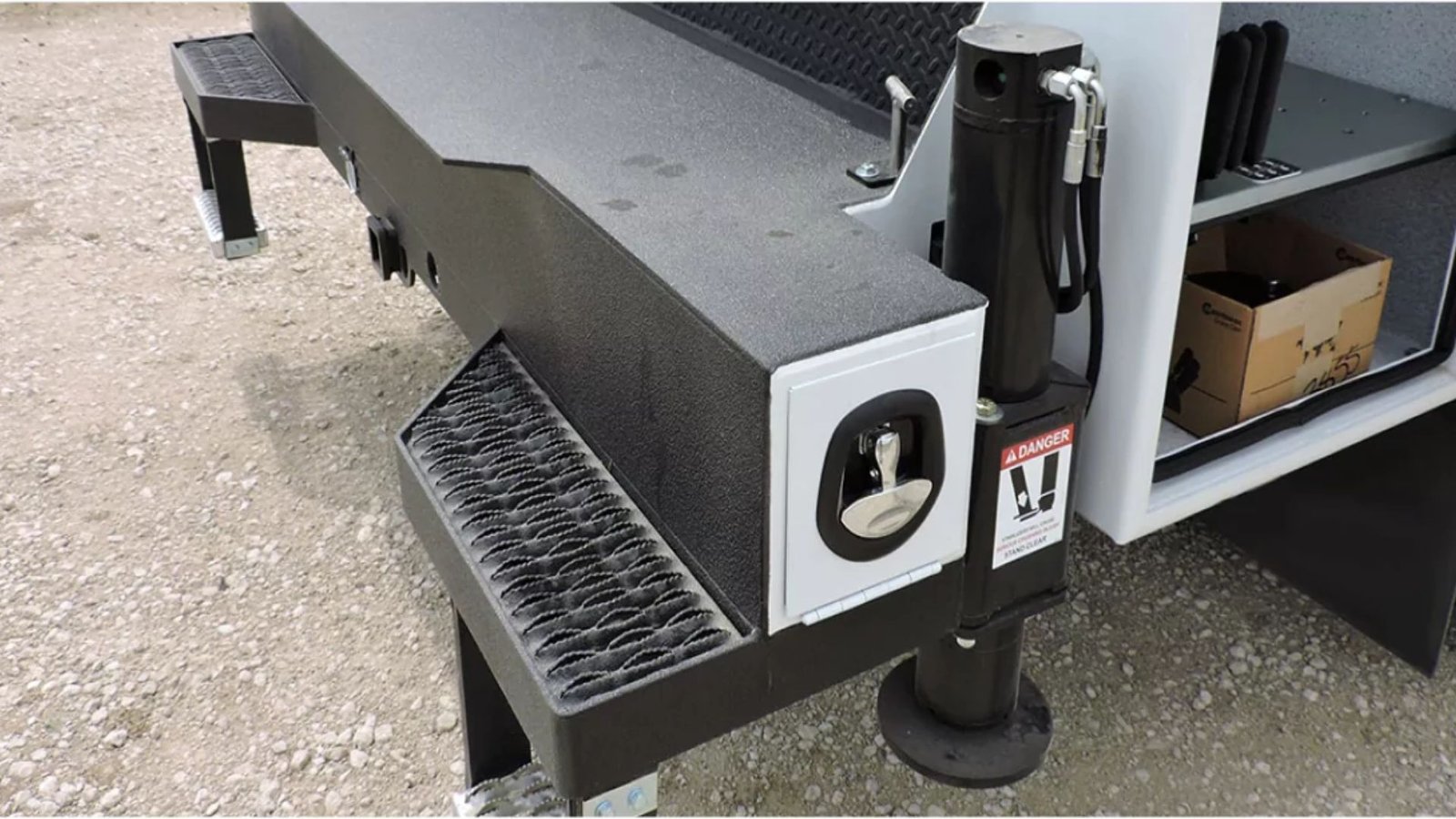 Close-up of a textured protective specialty coating on a commercial truck panel