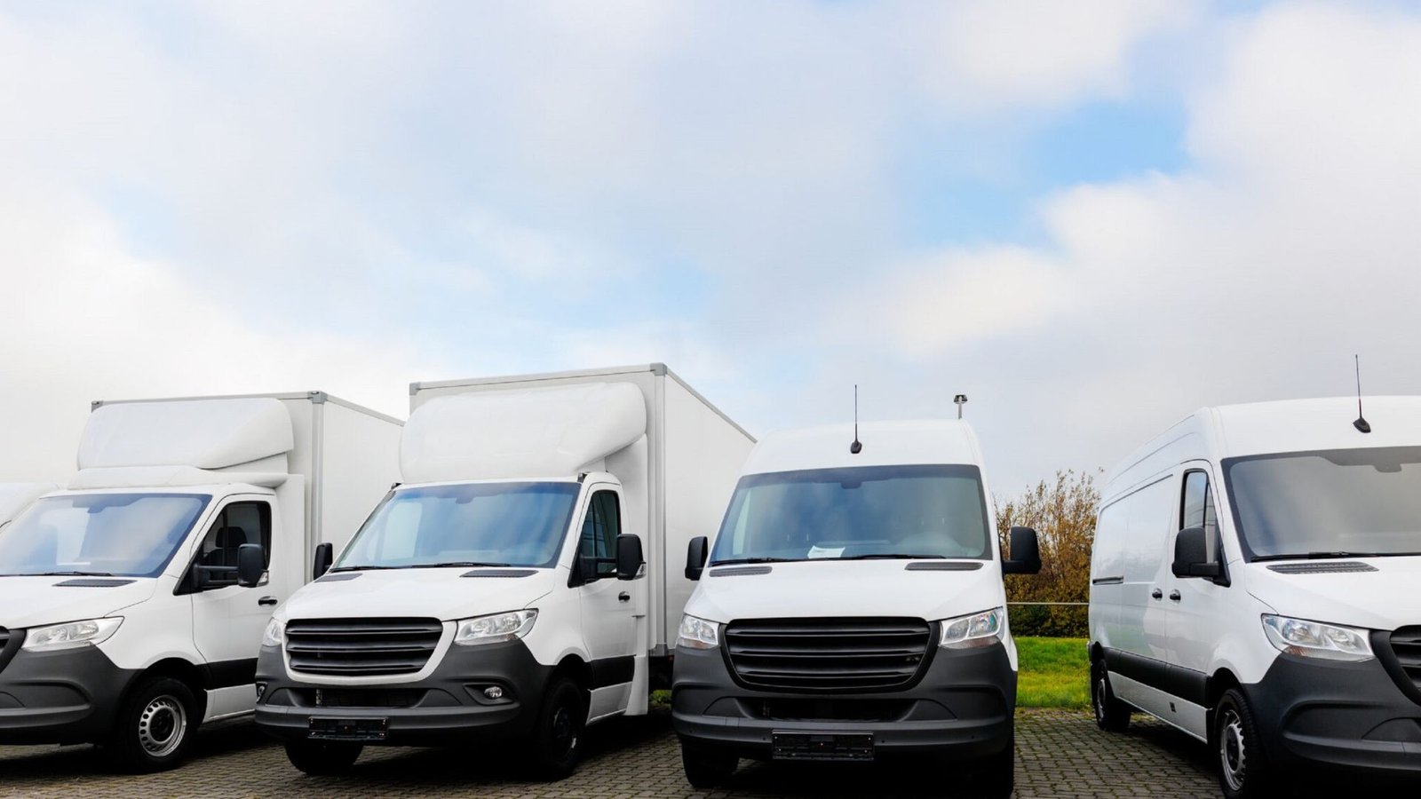 Delivery van with clean branding parked for last-mile service
