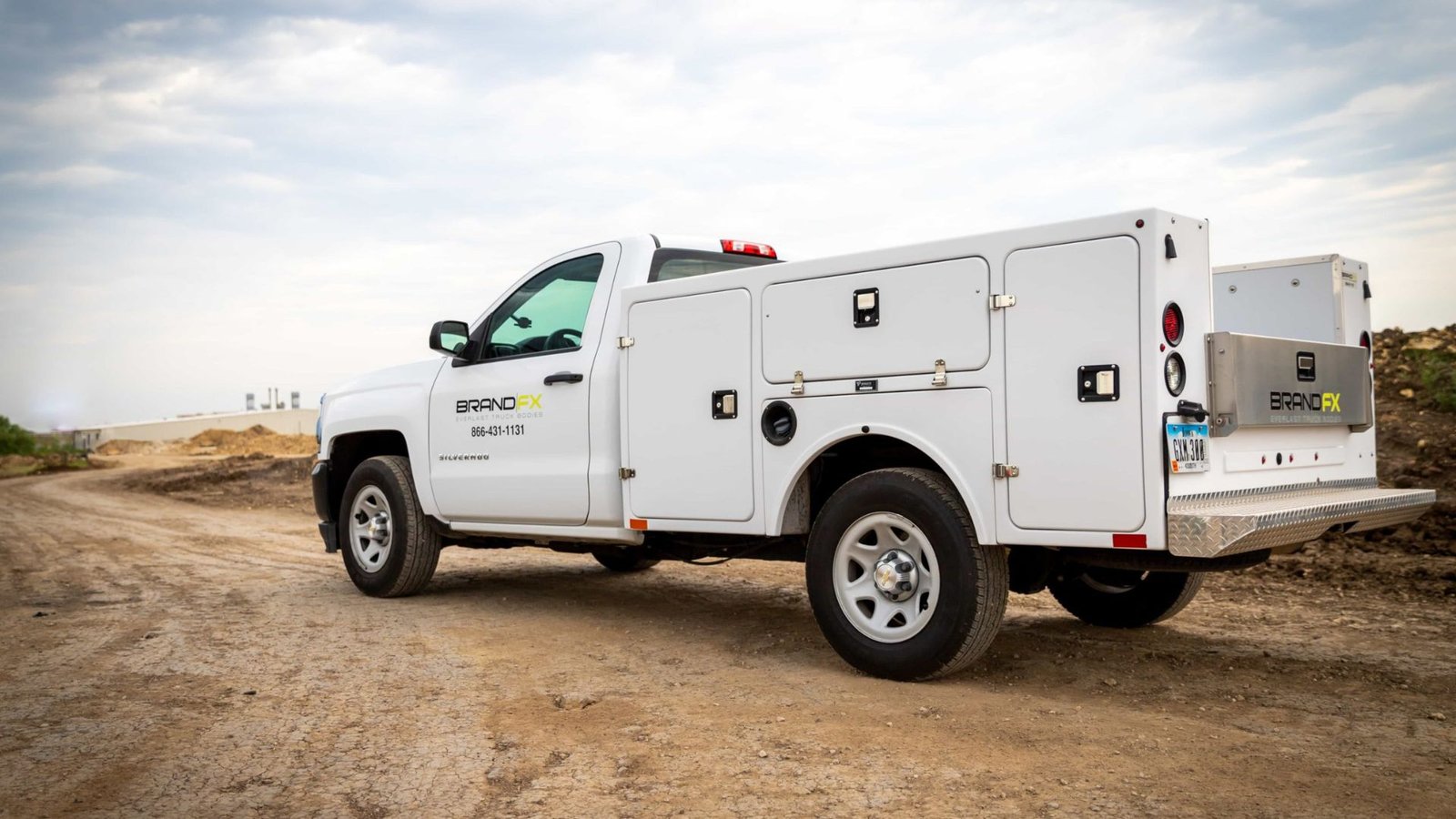 Branded service and trade truck in a residential driveway